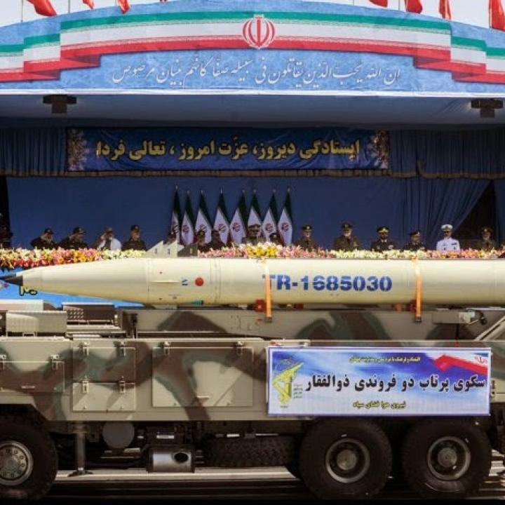 An Iranian Fateh-110 mobile missile launcher on parade