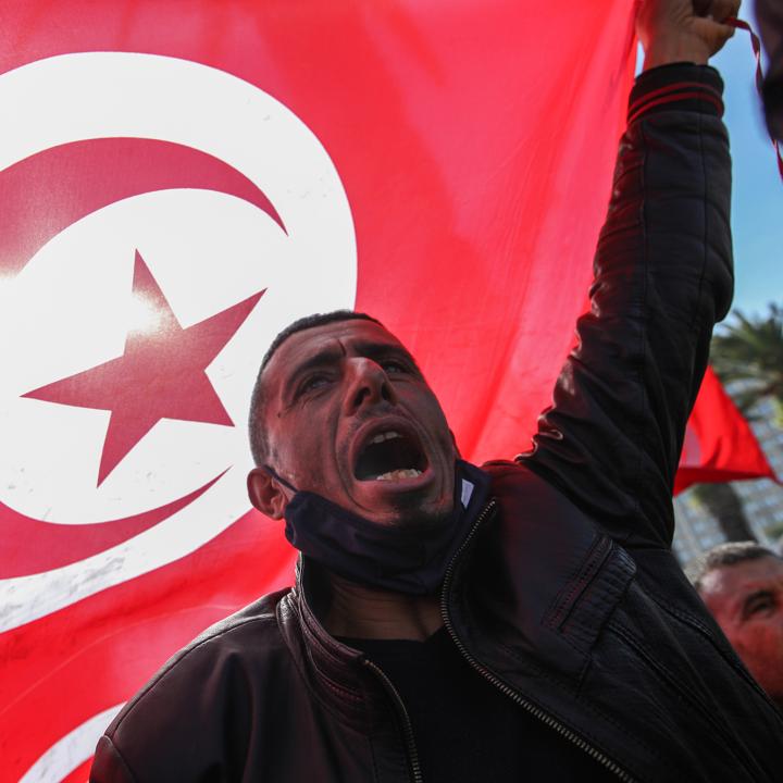 A supporter of Tunisia's Islamist Ennahda Party protests against the Tunisian president's 2022 coup - source: Reuters