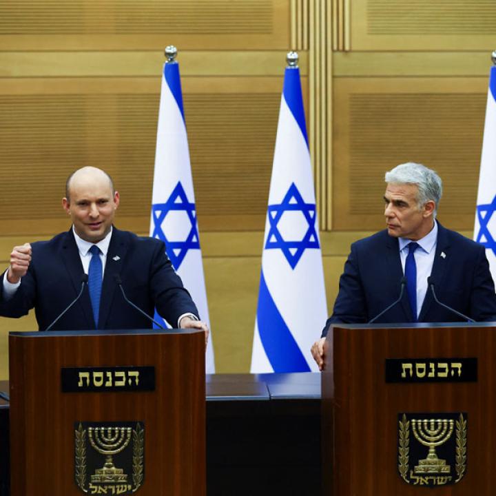 Photo of Israeli politicians Naftali Bennett and Yair Lapid delivering a statement..