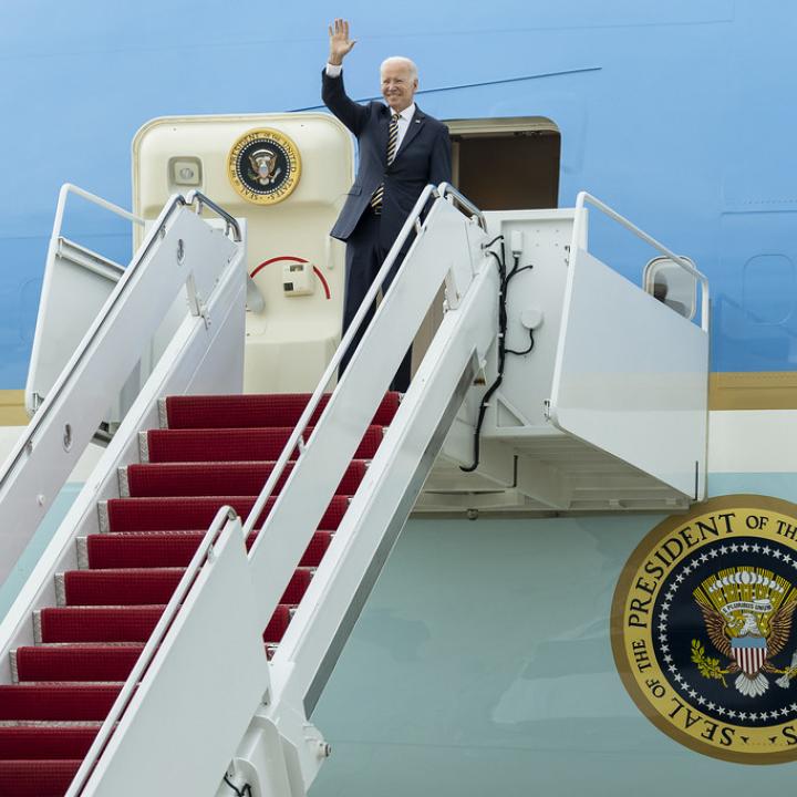 President Joe Biden waves from the steps of Air Force One - source: White House photo