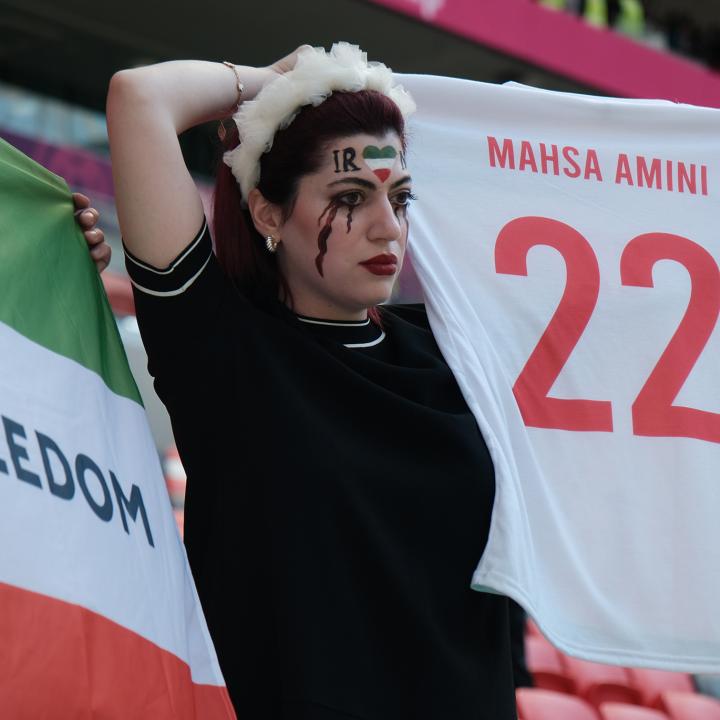 An Iranian soccer fan protests at a World Cup game in Qatar - source: Reuters