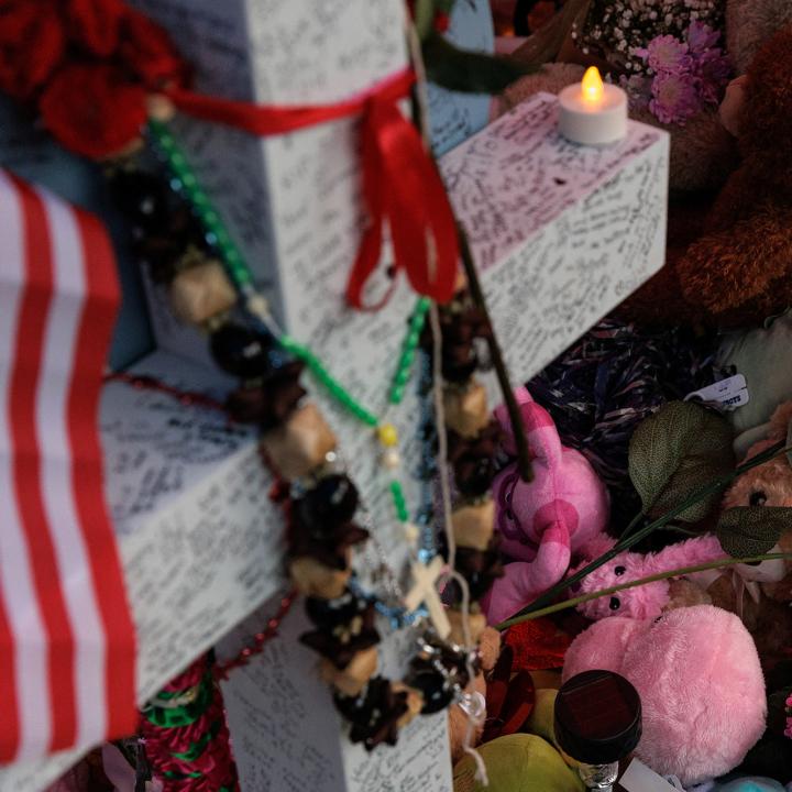 A memorial to victims of the mass shooting at the Allen Premium Outlet mall near Dallas, Texas - source: Reuters