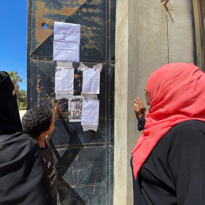 People look at the list of missing people, in the aftermath of the floods in Derna, Libya - source: Reuters