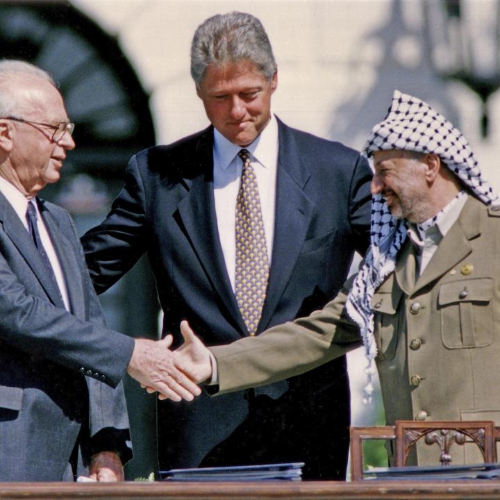 Oslo handshake: Yitzhak Rabin, Bill Clinton, Yasser Arafat