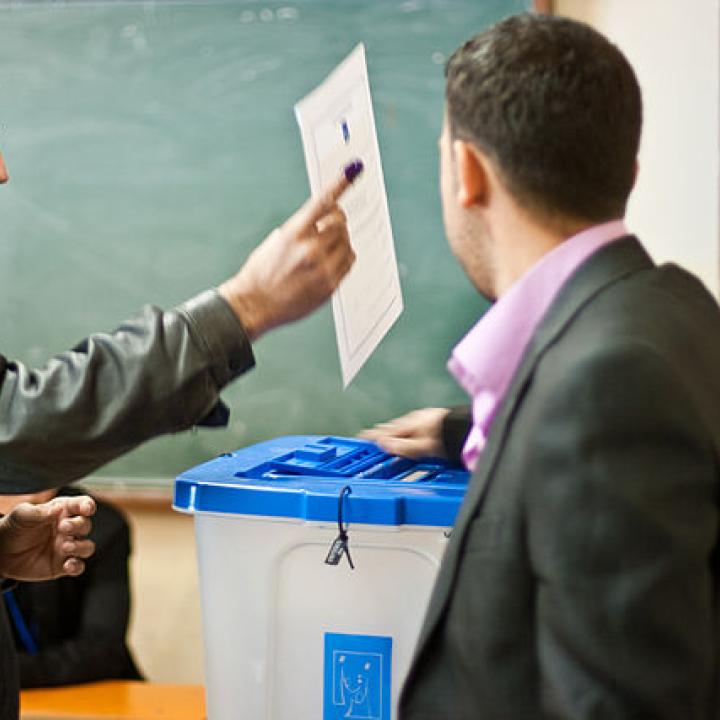 Iraqi citizens at the ballot box