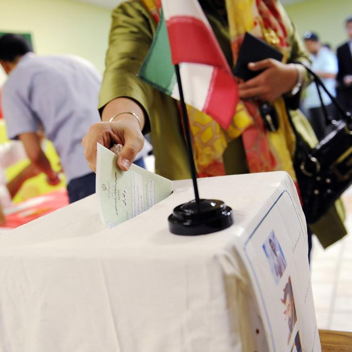 A woman casts her ballot in the 2009 Iranian election - source: Reuters