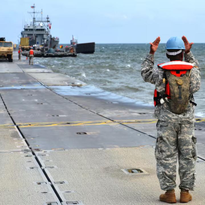 U.S. Army personnel prepare a temporary floating pier to deliver aid to Gaza - source: Department of Defense