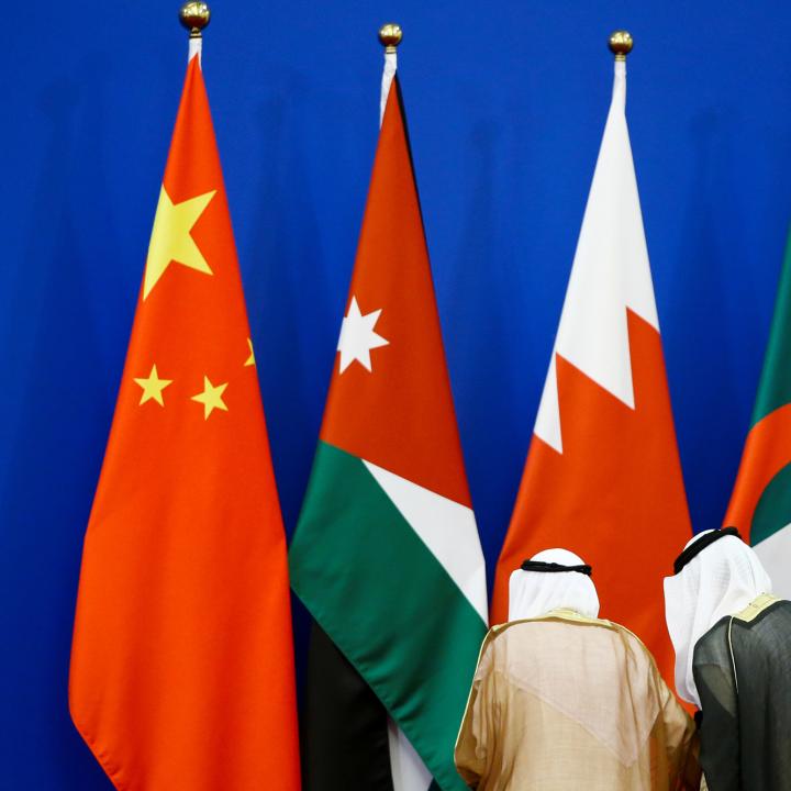 Delegates and flags at the 2018 China-Arab Forum - source: Reuters