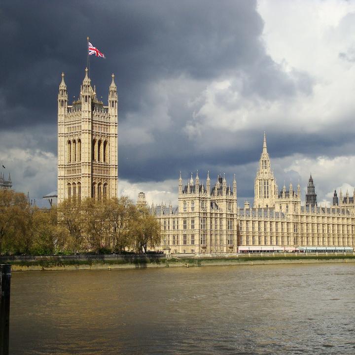 A view of the Palace of Westminister from across the River Thames, with the Victoria Tower and the House of Lords in the foreground - source: Wikimedia Commons
