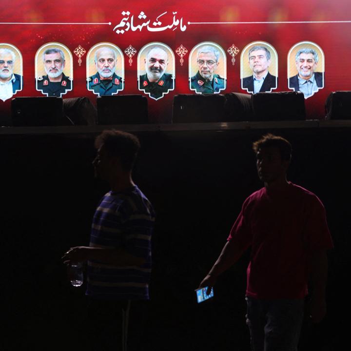 A sign in Tehran displays images of officials in Iran's nuclear program killed in Israeli airstrikes in June 2025 - source: Reuters
