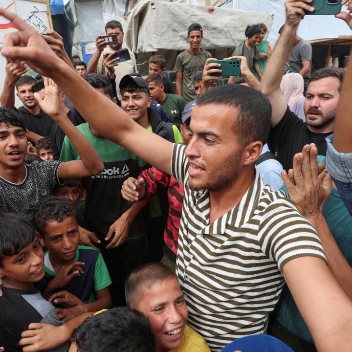 Palestinians celebrate news of a ceasefire between Israel and Hamas in October 2025 - source: Reuters