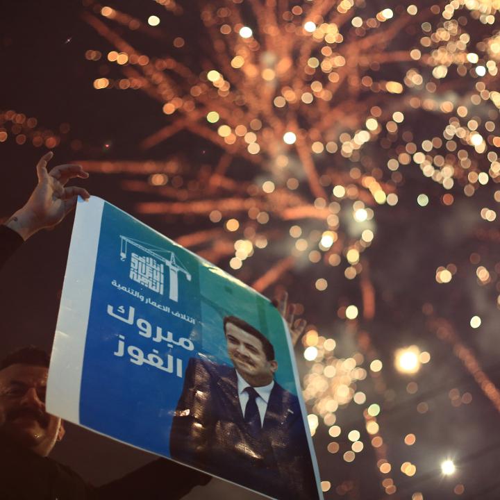 Supporters of Iraqi prime minister al-Sudani celebrate with fireworks as results of the country's November 2025 parliamentary elections are announced - source: Reuters