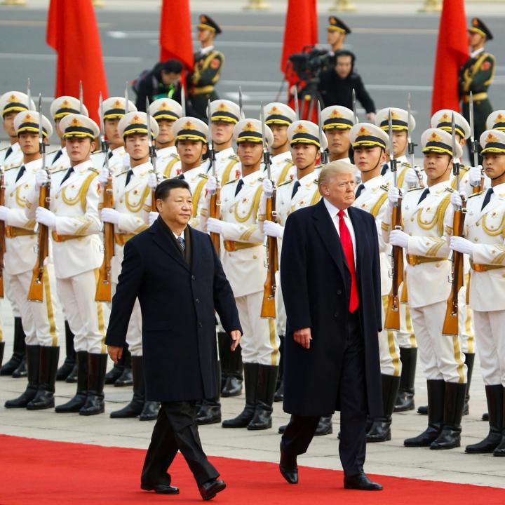 Chinese president Xi walks with U.S. president Trump in Beijing in 2017 - source: Reuters