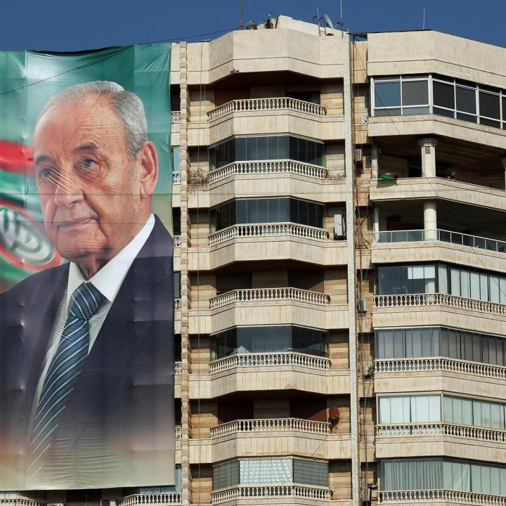 Photo of a large banner on a building in Lebanon showing Speaker of Parliament Nabih Berri.