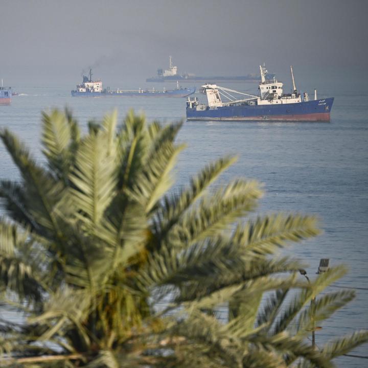 Ships gather in waters off the Iranian island of Bandar Abbas along the Strait of Hormuz - source: Reuters