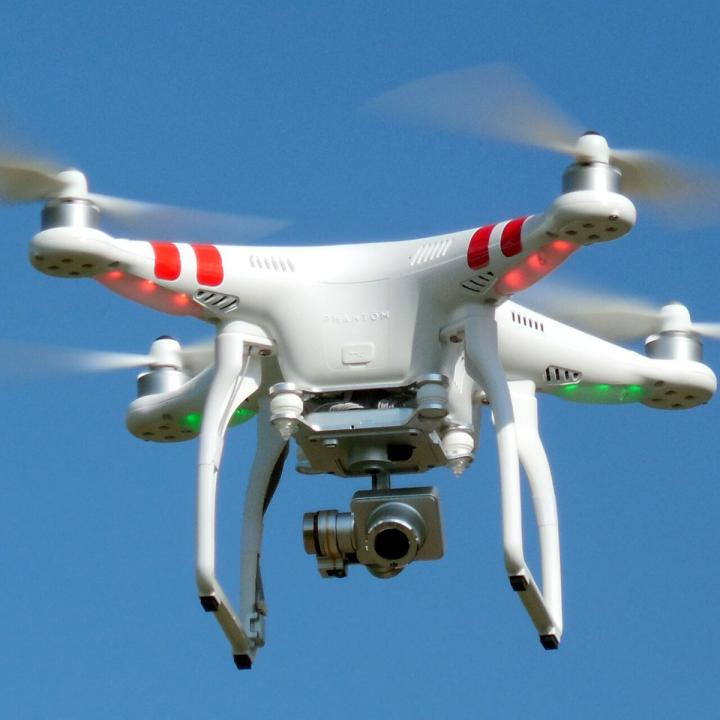 Photo of a small drone in flight.