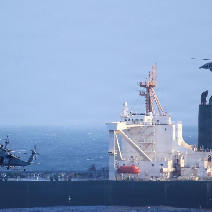 U.S. military helicopters interdict an oil tanker on suspicion of aiding the Iranian regime.