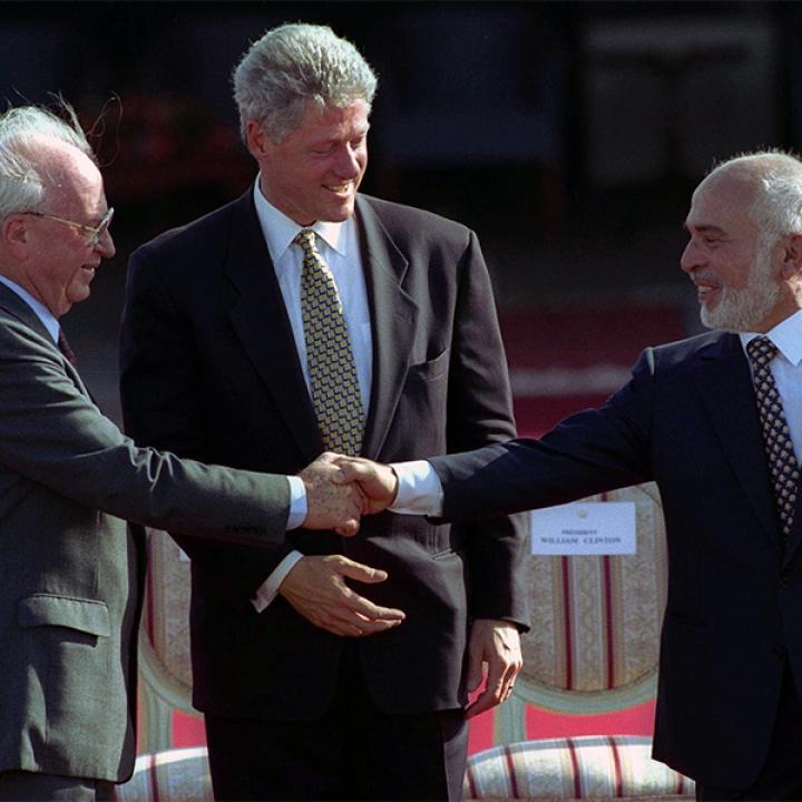 Isaeli Prime Minister Yitzhak Rabin shakes hands with Jordanian King Hussein in front of U.S. President Bill Clinton at the White House in 1994.