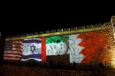 U.S., Israeli, Bahraini, and Qatari flags on a mural celebrating the Abraham Accords