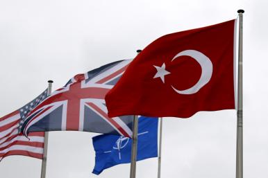 The flags of Turkey, the United States, United Kingdom, and NATO in Brussels