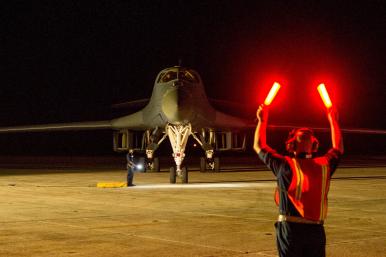 USAF ground crew directs a B-1 Lancer bomber