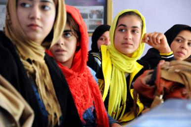 Afghan women attend a photography class, 2013.