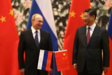 Russian President Vladimir Putin meets Chinese President Xi Jinping at a summit in Beijing - source: Reuters