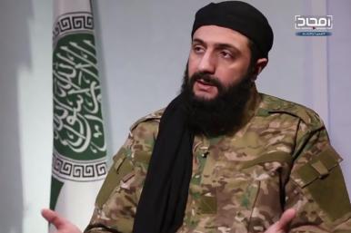 Abu Muhammad al-Jawlani, leader of Hayat Tahrir al-Sham, speaks in a recorded interview released in Jan. 2019. Photo credit: Screenshot by Cole Bunzel via Twitter.