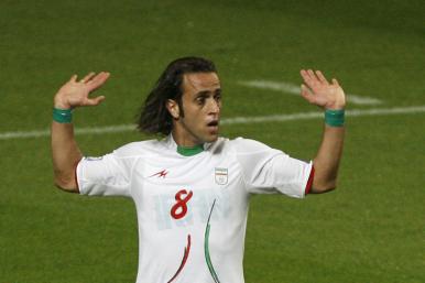 Iran's Ali Karimi, wearing green wristbands at a 2010 World Cup qualifier - source: Reuters