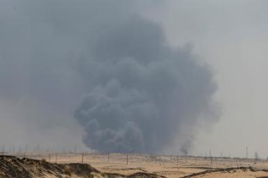 Smoke is seen at a Saudi oil facility in Abqaiq, 2019 - source: Reuters