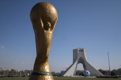 A statue of the men's FIFA World Cup trophy on display in downtown Tehran, Iran - source: Reuters