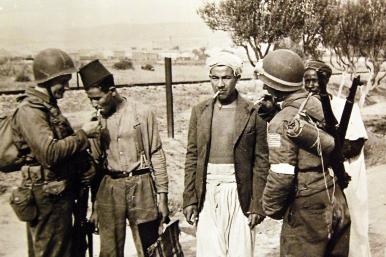 US Army soldiers meet local civilians in Morocco during Operation Torch in November 1942 - source: U.S. Army