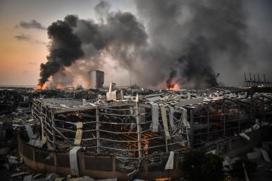 Fires burn after the August 2020 port explosion in Beirut - source: Reuters