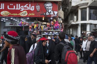 Shoppers at a marketplace in Karbala, Iraq