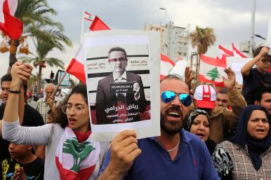 Lebanese protesters demonstrate against central bank official Riad Salameh in Tyre in 2019 - source: Reuters