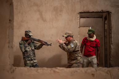 A United States Air Force trainer works with soldiers of the Nigerian Armed Forces - source: U.S. government