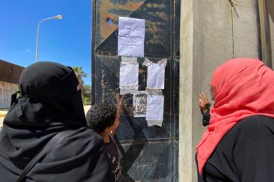 People look at the list of missing people, in the aftermath of the floods in Derna, Libya - source: Reuters