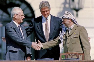 Oslo handshake: Yitzhak Rabin, Bill Clinton, Yasser Arafat
