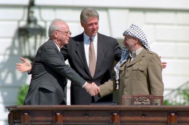 Israeli PM Yitzakh Rabin and PLO Chairman Yasser Arafat shake hands
