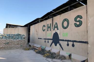 Photo of a blast wall with a drone mural at al-Asad Air Base in Iraq.