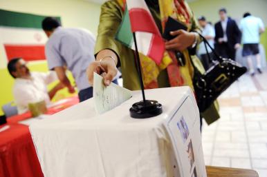 A woman casts her ballot in the 2009 Iranian election - source: Reuters