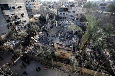 A view of a Palestinian neighborhood reduced to rubble in Gaza - source: Reuters
