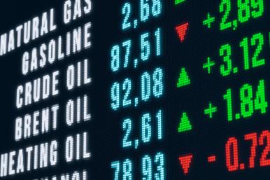 A video board displays various oil and gas commodity prices in September 2023 - source: Reuters