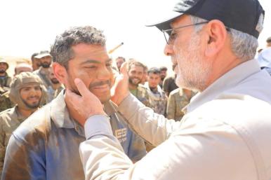 Esmail Qaani with a Fatimiyoun soldier in Syria