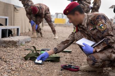 A soldier from Iraq's Counter Terrorism Service participates in a joint training exercise with U.S. colleagues - source: U.S. Department of Defense