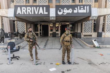 Photo showing Syrian rebels outside Aleppo International Airport.