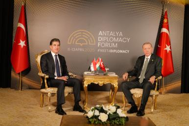 Barzani and Erdogan sitting across from each other, April 2025
