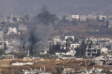 Smoke from an explosion across the Israeli border in Gaza, May 2025.