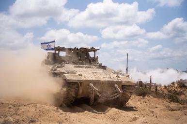 An IDF tank flies the Israeli flag while on operation inside Gaza in 2025 - source: IDF