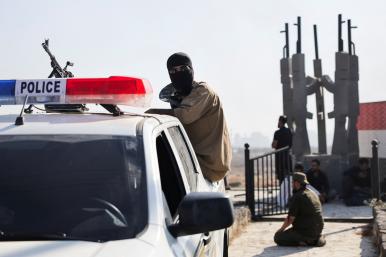 Bedouin fighters stopped at a government checkpoint near Suwayda in July 2025 - source: Reuters